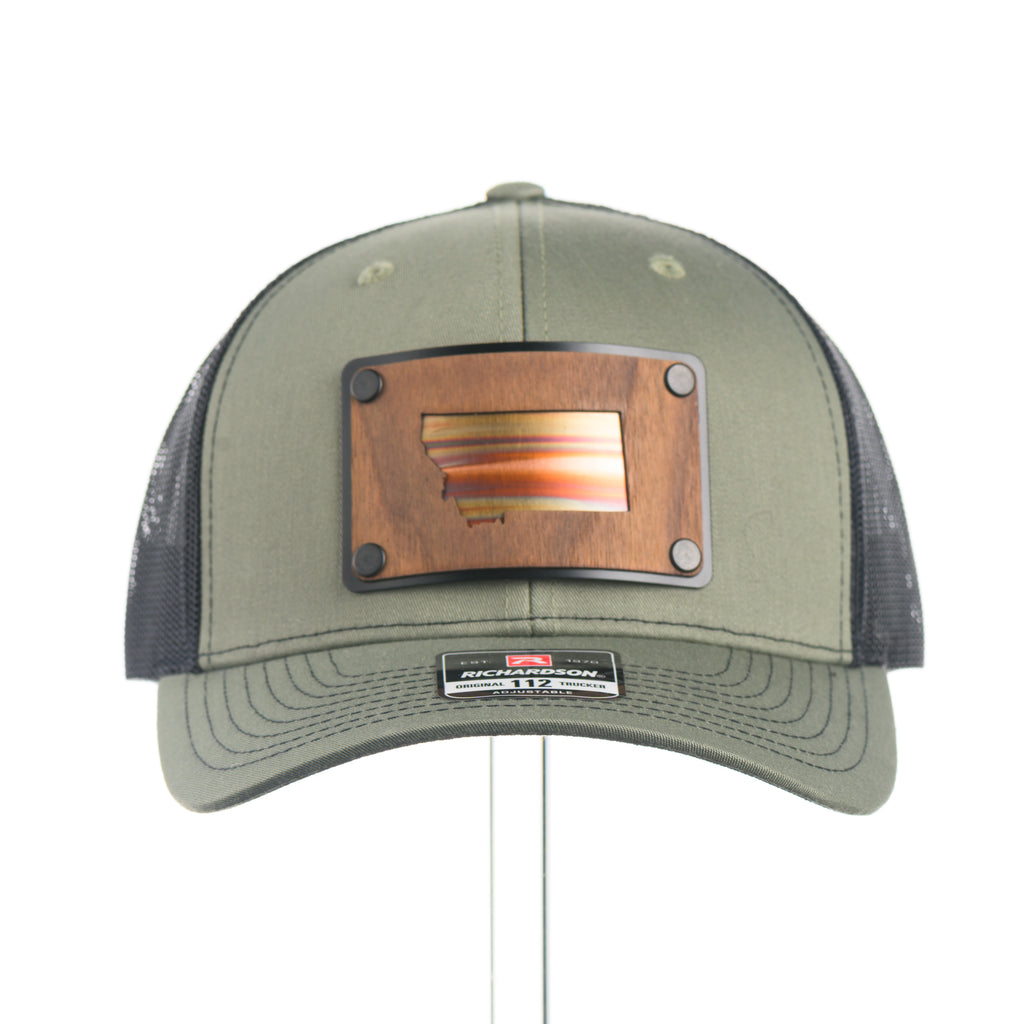 Green trucker cap with wood and copper Montana patch and Richardson logo on a white background