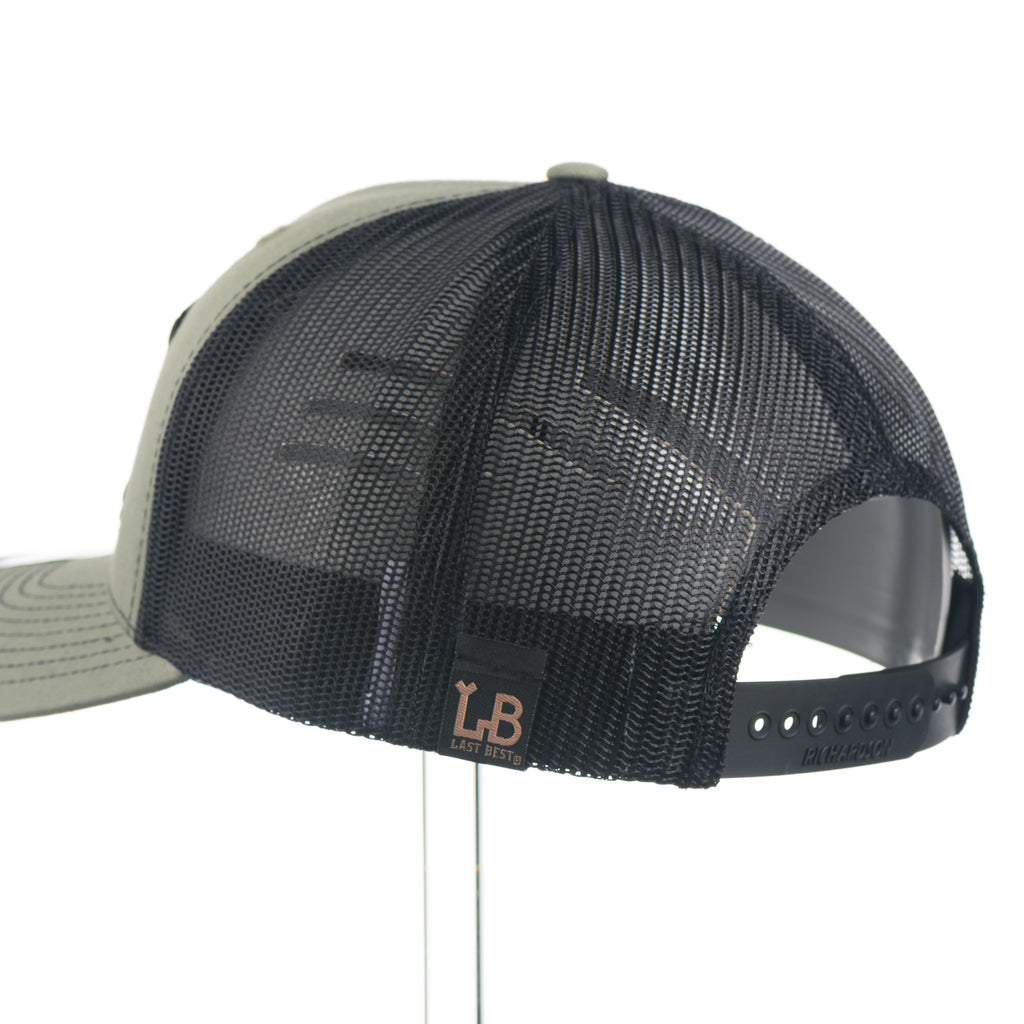 Richardson 112 Trucker cap with black mesh back and olive green front panel on a white background